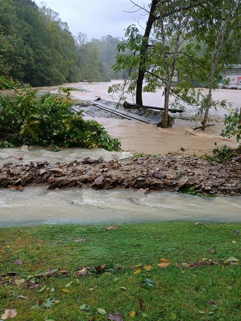 Hurricane Helene floodwaters dislodged the Stevens’ bridge and wedged it against trees. Photo courtesy of Alice and Gary Stevens
